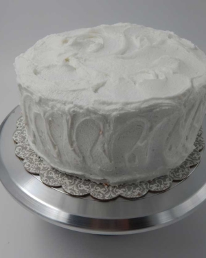 A vanilla cake is a light & airy cake paired with smooth vanilla icing